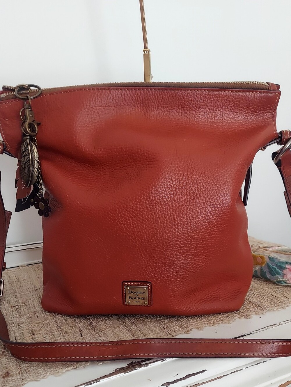 Dooney & Bourke Women's Leather Crossbody Bag in Rust